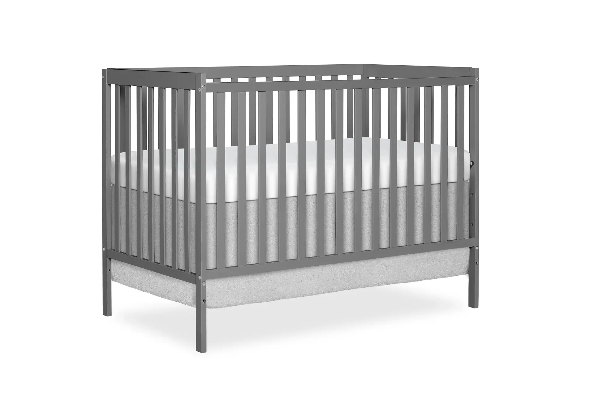 Dream on me Synergy Crib with vertical slats and a white mattress, shown against a white background.