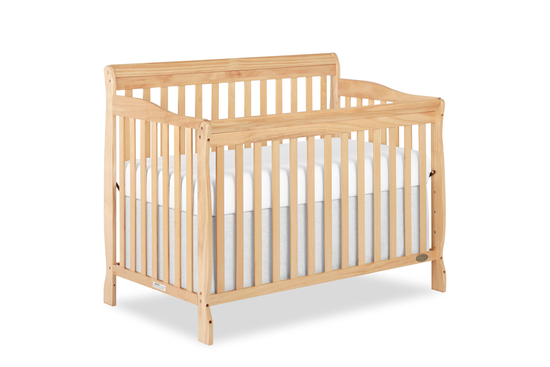 Dream On Me Ashton crib with curved side rails and vertical slats, featuring a white mattress.