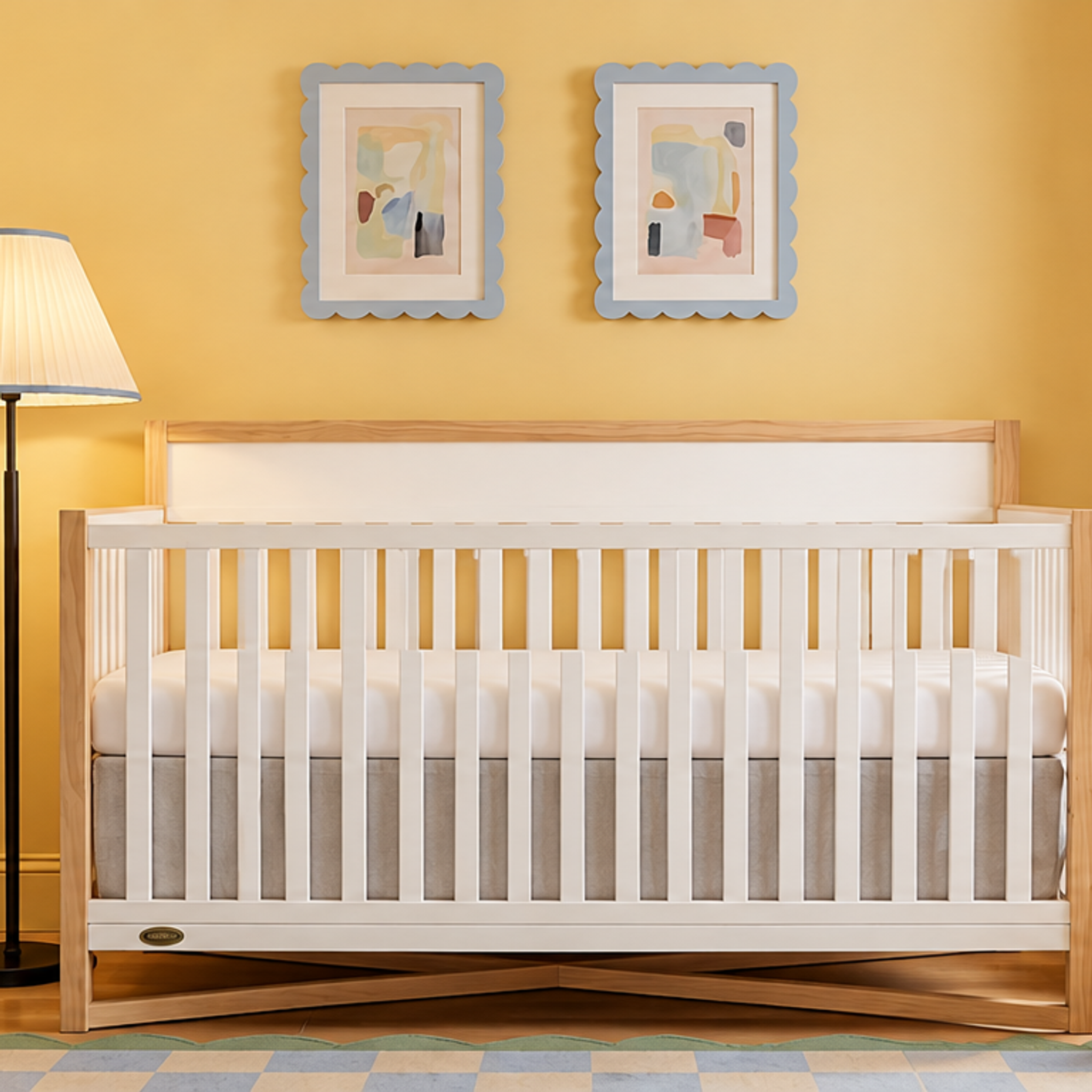 A yellow nursery with a white and wood crib, a light blue dresser, and decorative shelves.