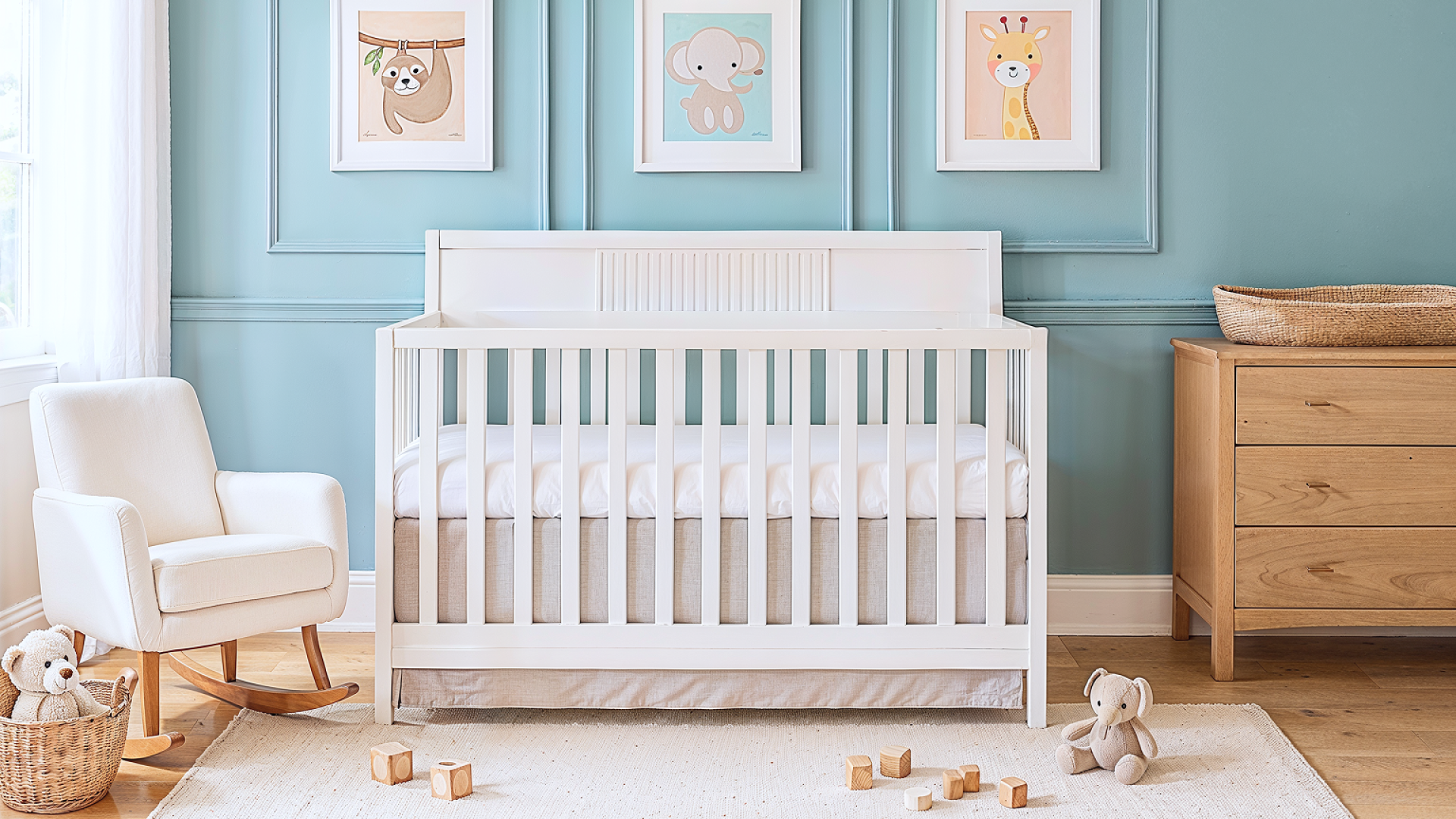Dream On Me Ivy 5-in-1 Convertible crib in a playful nursery with teal walls, animal-themed wall art, wooden dresser, and cozy rocking chair