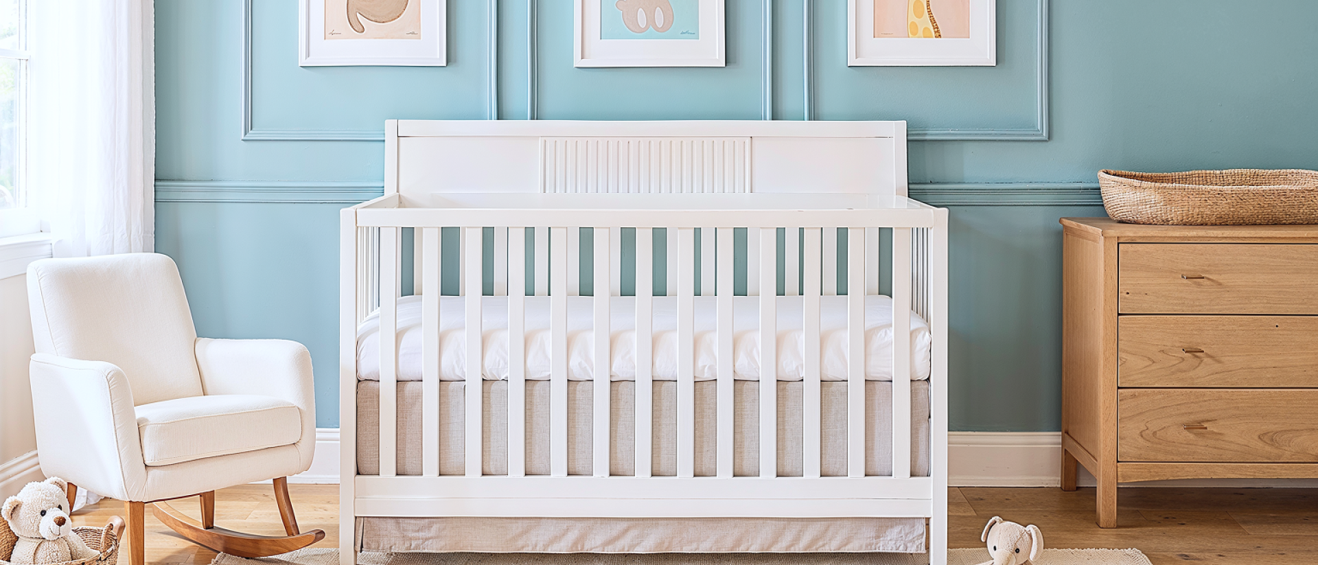 Dream On Me Ivy 5-in-1 Convertible crib in a playful nursery with teal walls, animal-themed wall art, wooden dresser, and cozy rocking chair