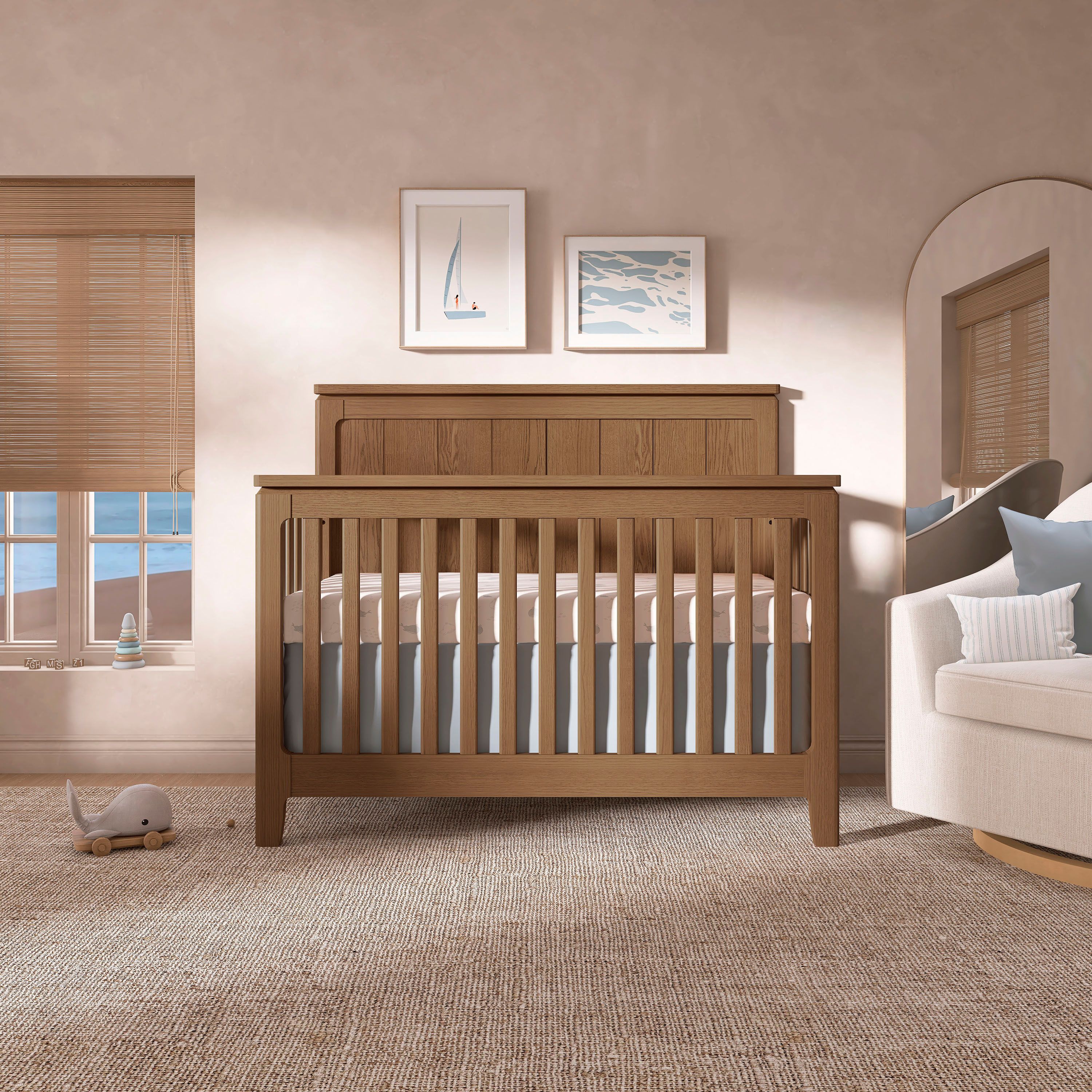 Evolur Oakley 5-in-1 Convertible Hickory wooden baby crib with slatted design and paneled headboard, stylish nursery furniture in a modern room setting