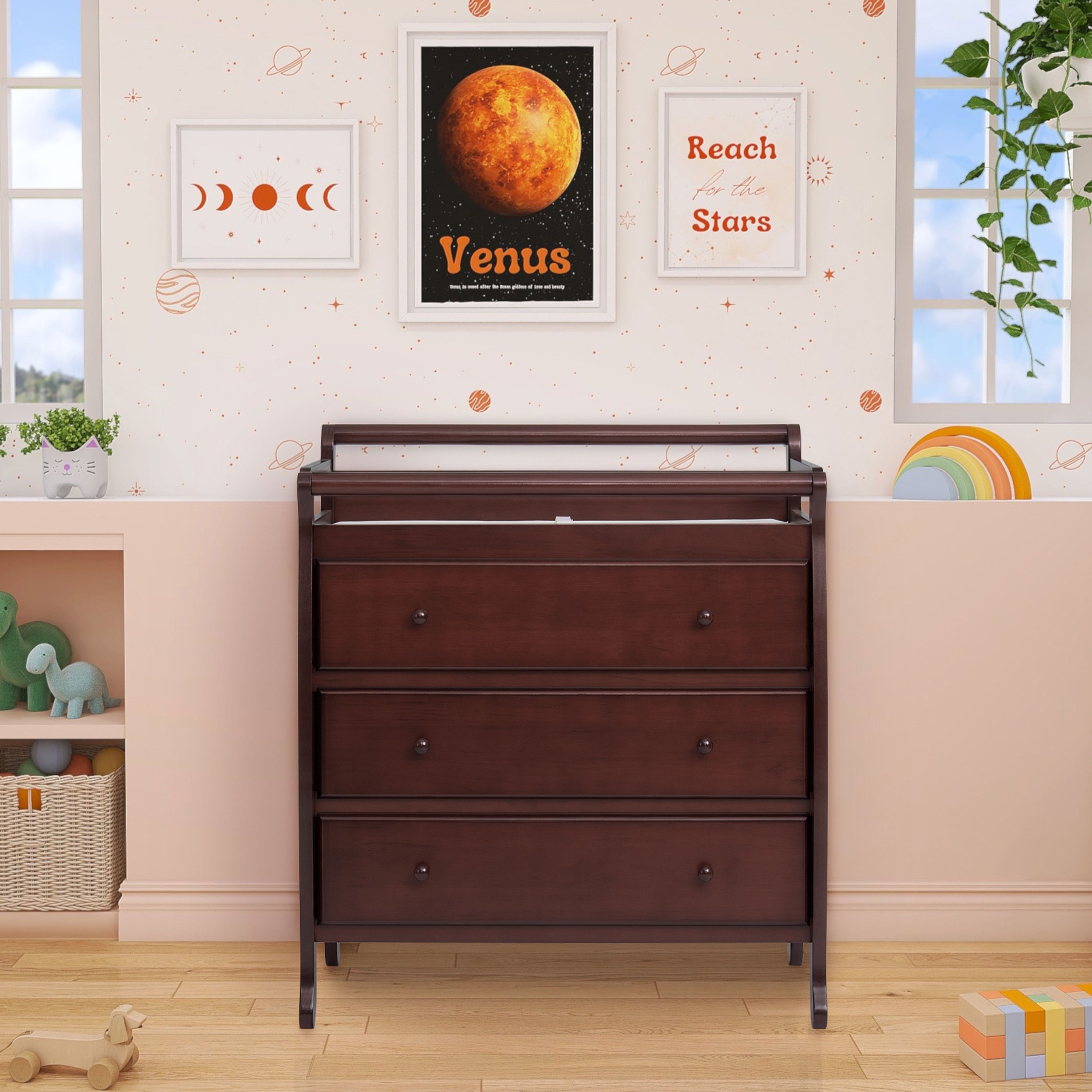 Dream On Me Liberty 3 Drawer Changing Table in espresso finish with spacious storage drawers in a space-themed nursery