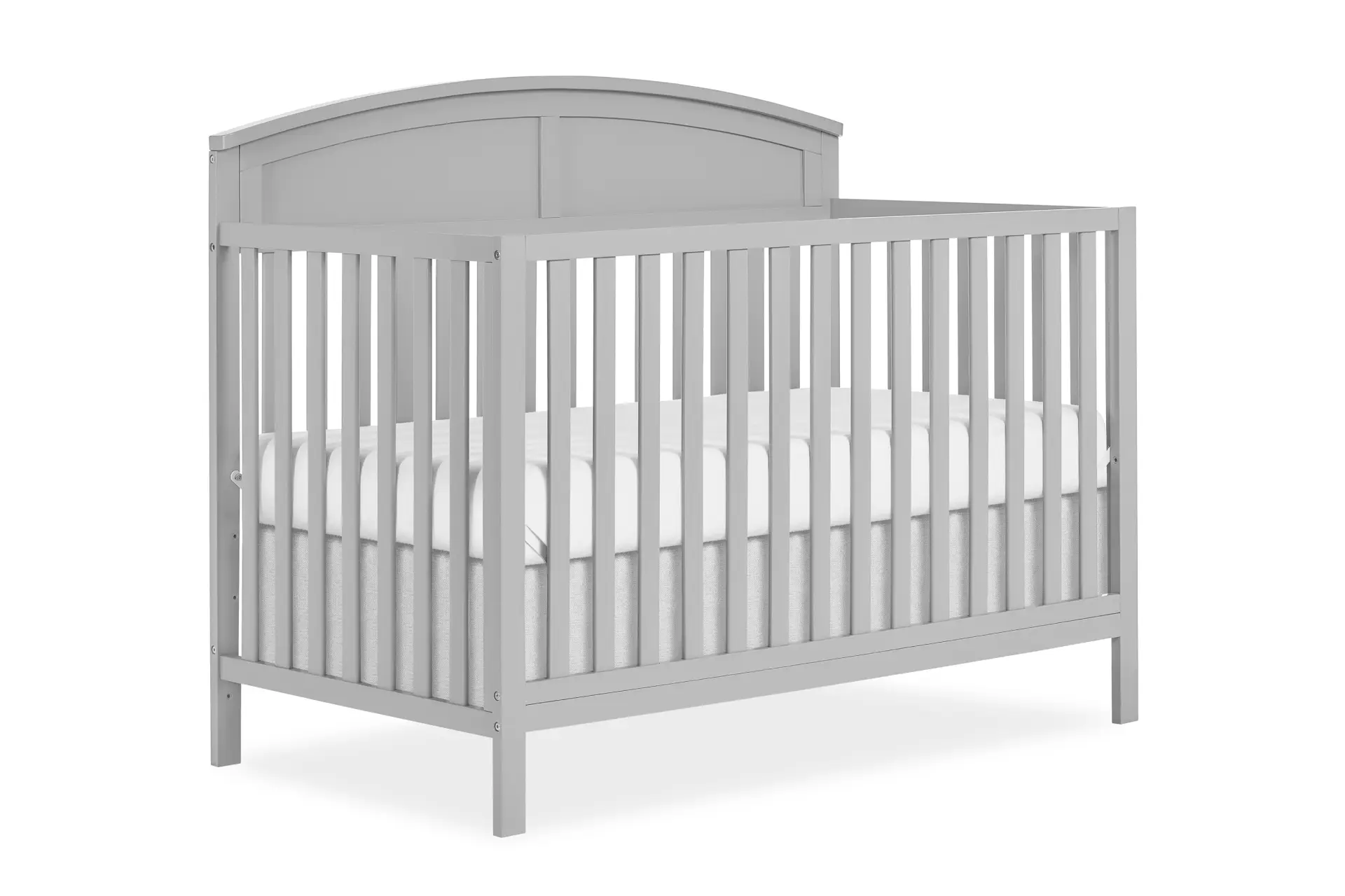 Dream On Me Storybrooke crib with an arched headboard and vertical slats, paired with a white mattress.