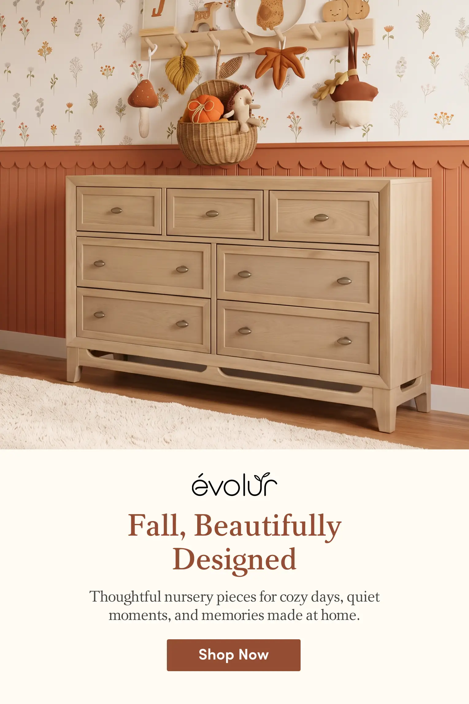 A light wood 7-drawer dresser in a fall-themed nursery with floral wallpaper and autumn decorations.