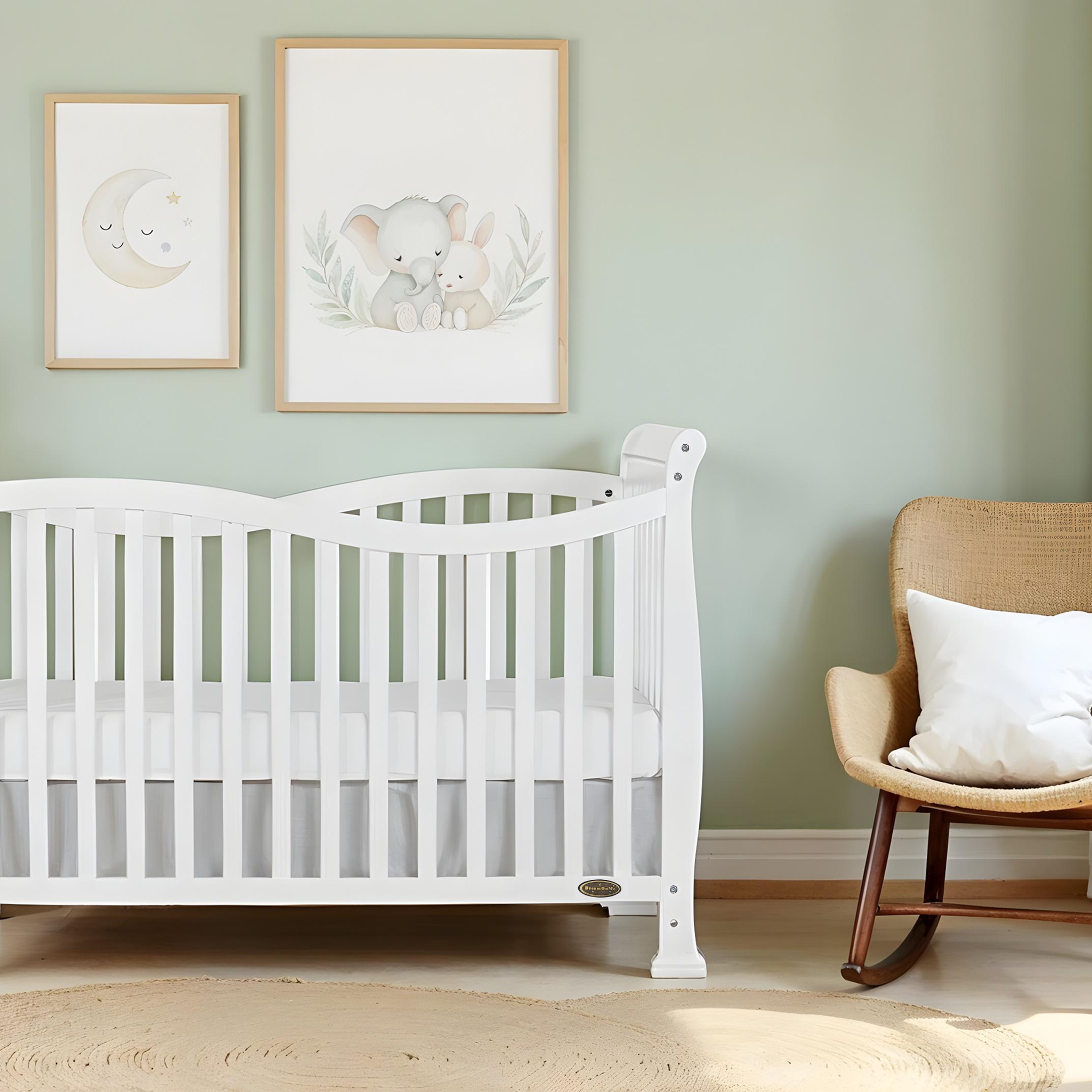 Minimalist baby nursery featuring Dream On Me Violet 7-in-1 Convertible Crib, sage green walls, animal artwork, and natural and non-toxic wood accents