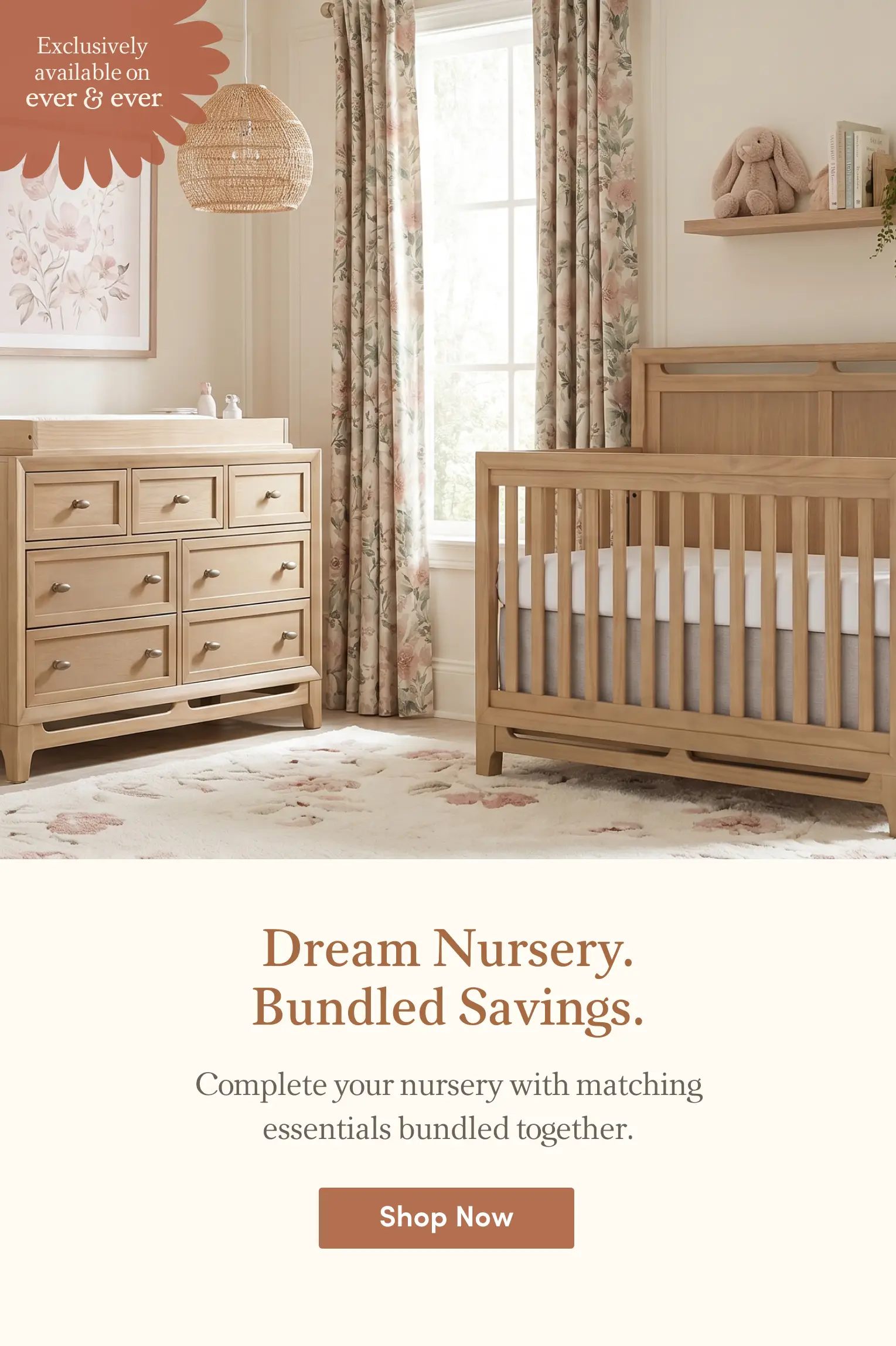 A beautifully decorated nursery with a light wooden crib, changing table, floral curtains, and a matching rug.
