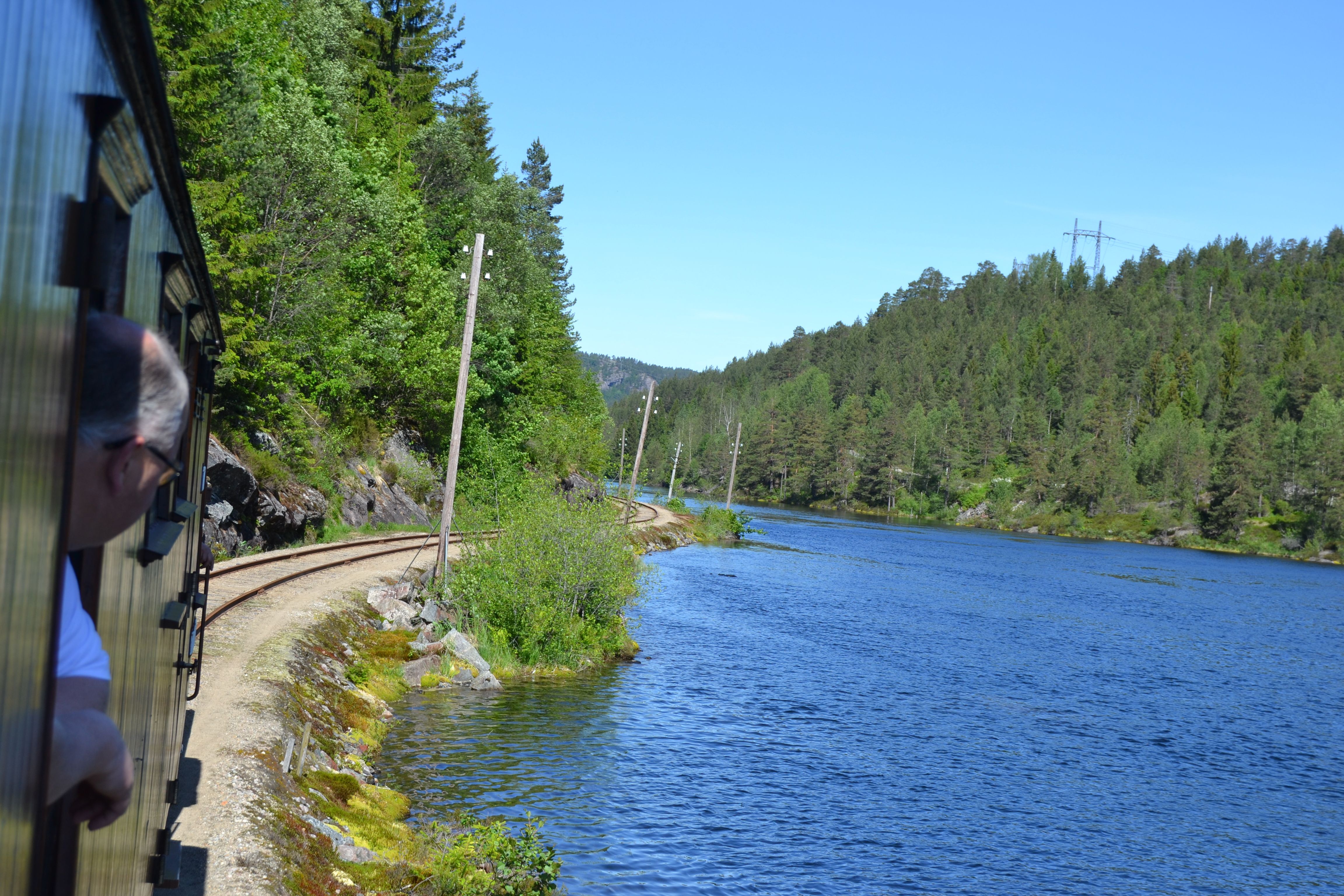 Trains running in beautiful natural surroundings