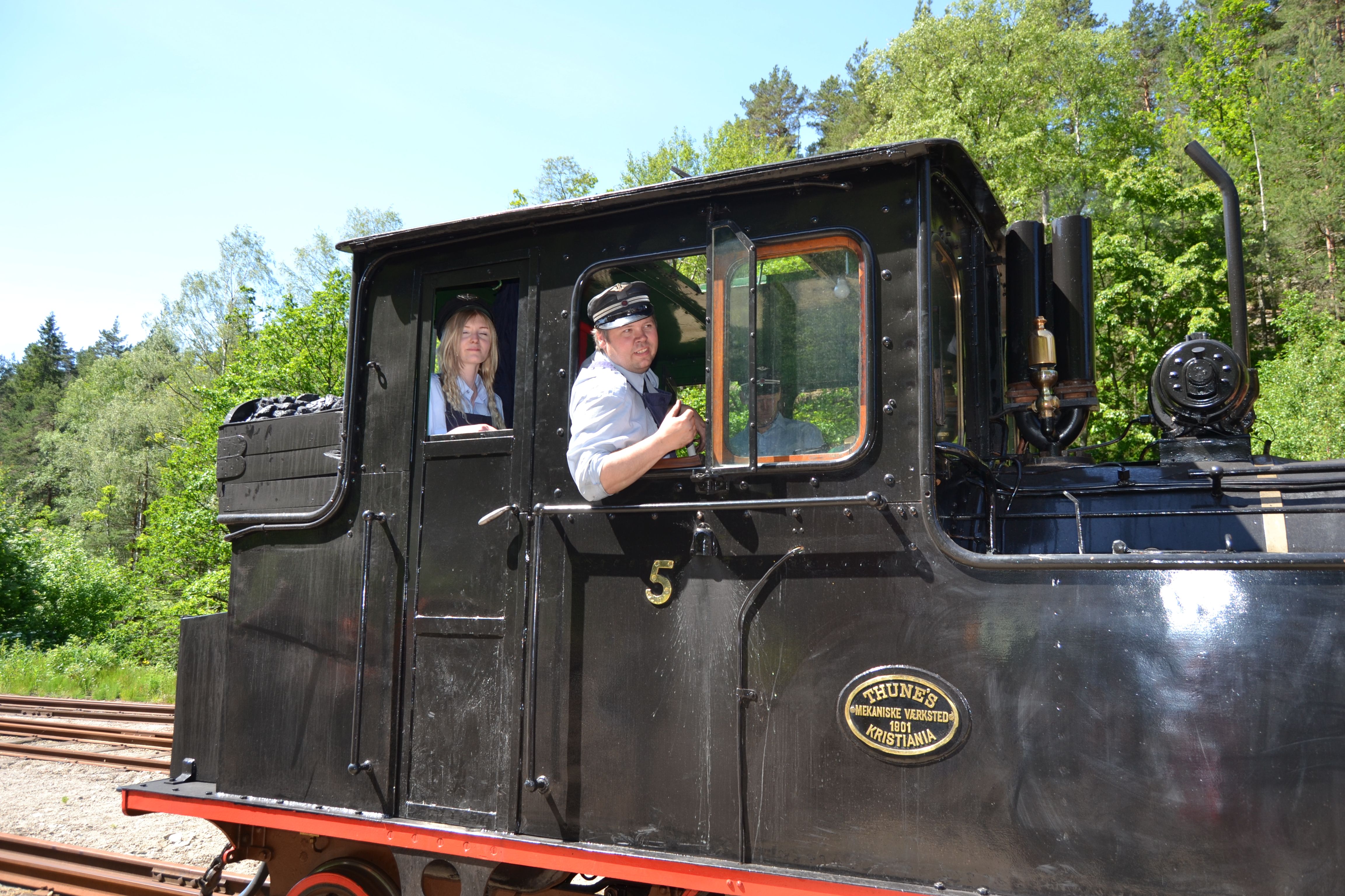 Driver and passenger on train