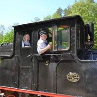 Driver and passenger on train