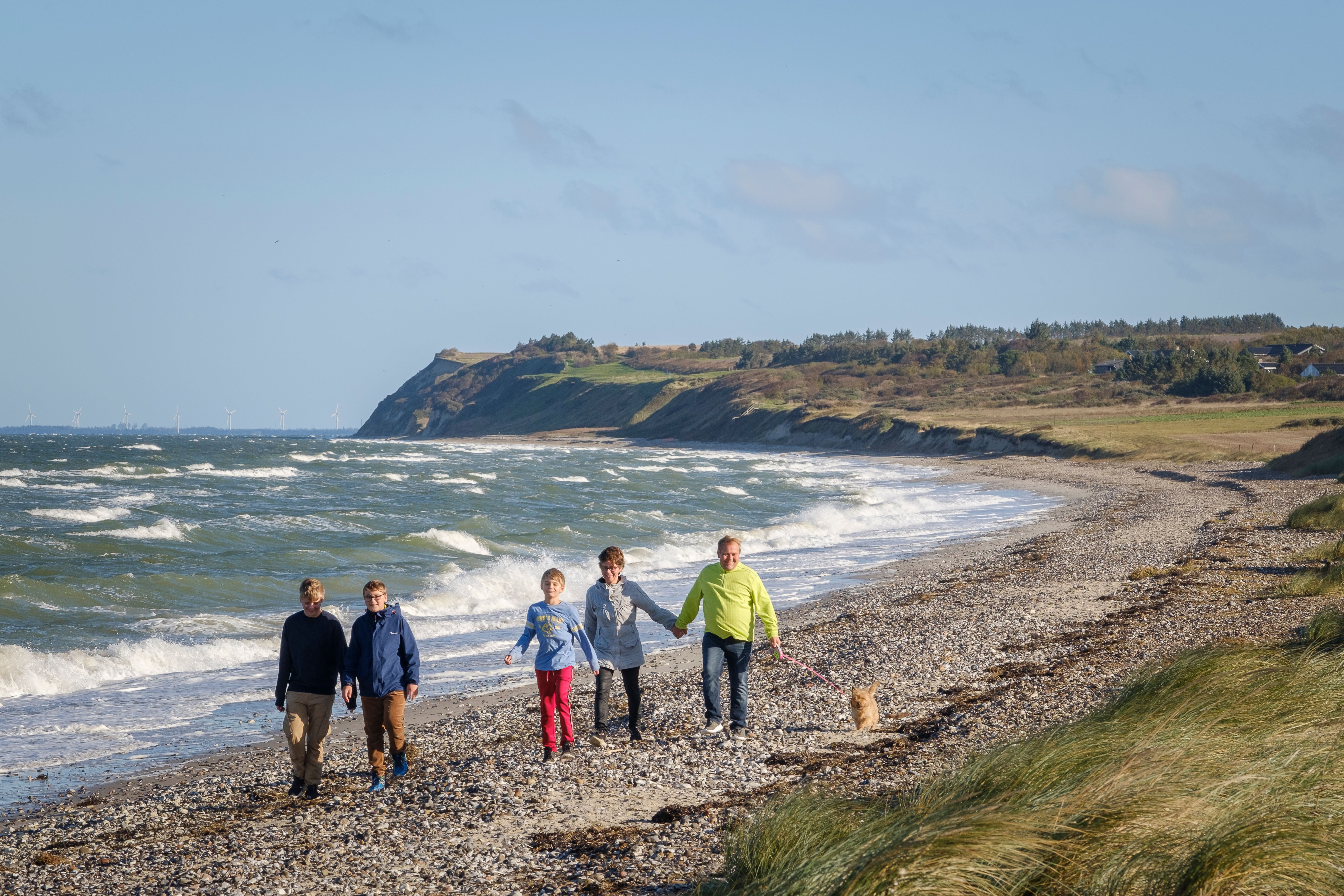 Foto av familie på stranden. 