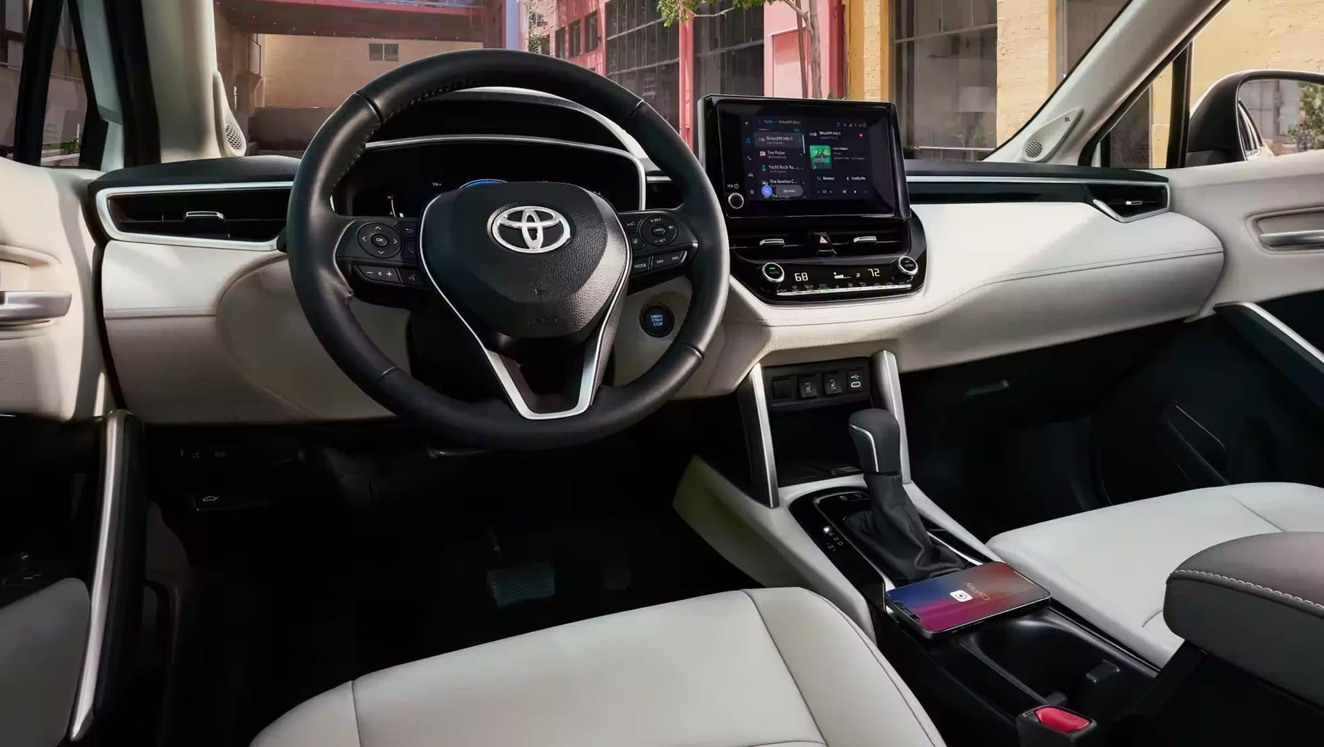 2023 Toyota Corolla Cross interior featuring touchscreen and wireless charging