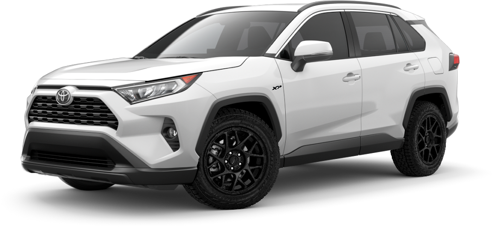 front side exterior shot of a white Toyota RAV4 XP XSeries upgraded accessories package