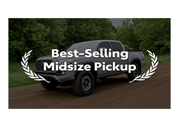 Toyota truck driving on country road with the words "Best-selling midsize pickup"