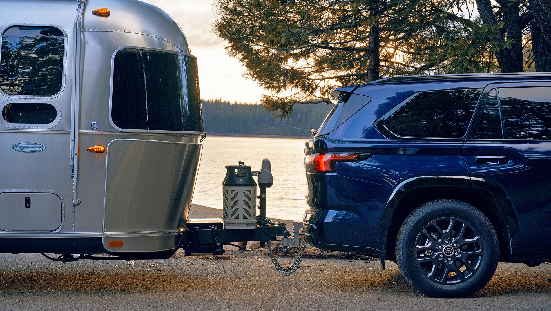 Blue Toyota Sequoia towing an airstream trailer