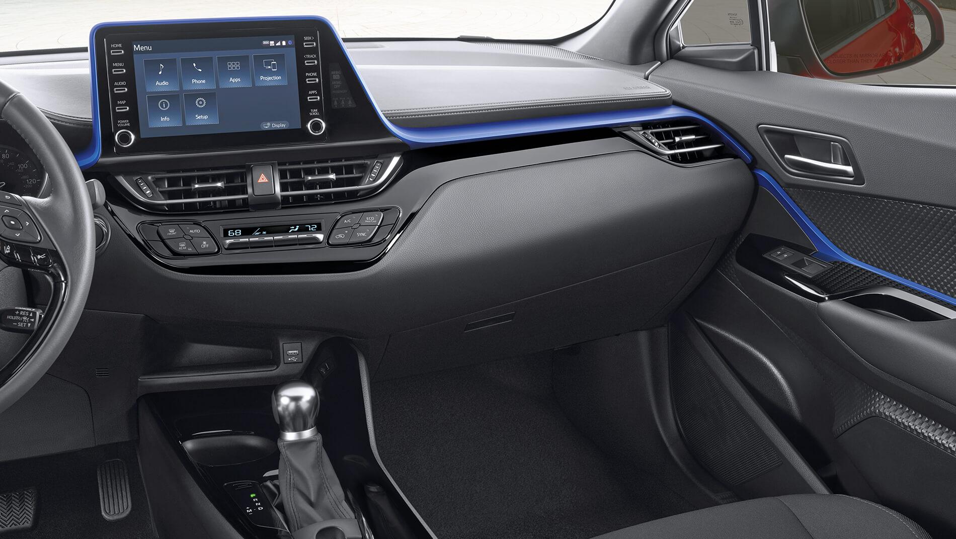 inside of a Toyota C-HR with grey interior and blue trim showing touchscreen