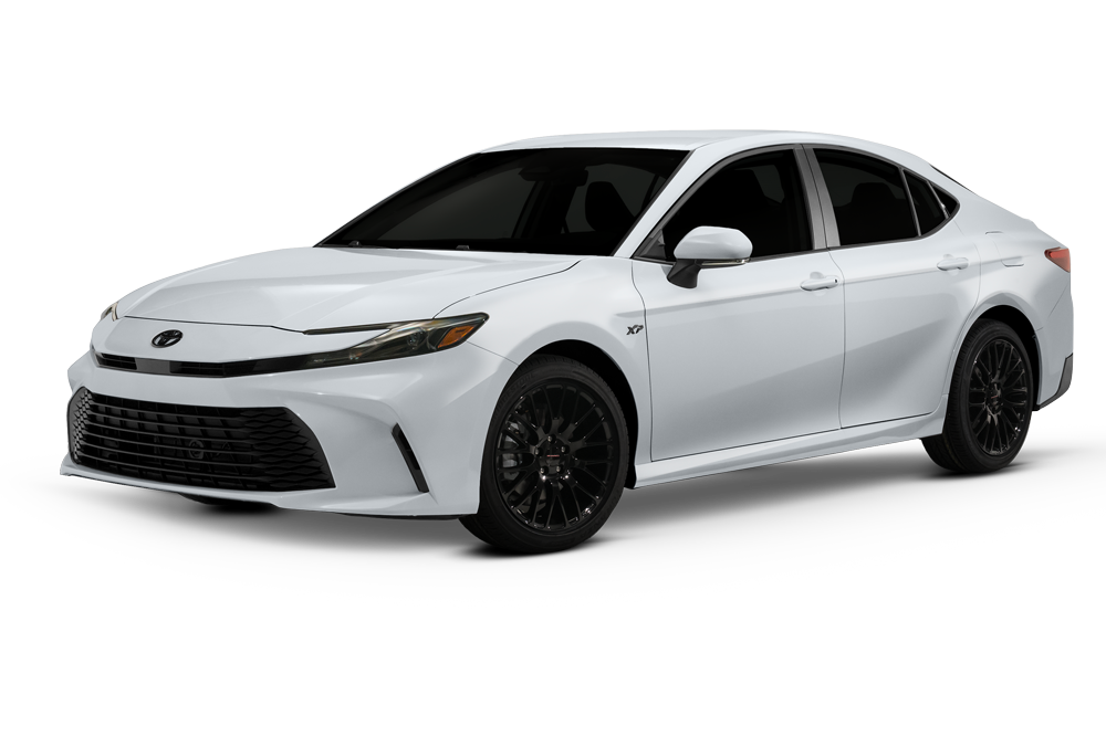 Exterior view of a Toyota Camry XP shadow Hybrid HEV. Showing off its sleek headlights and modern design.