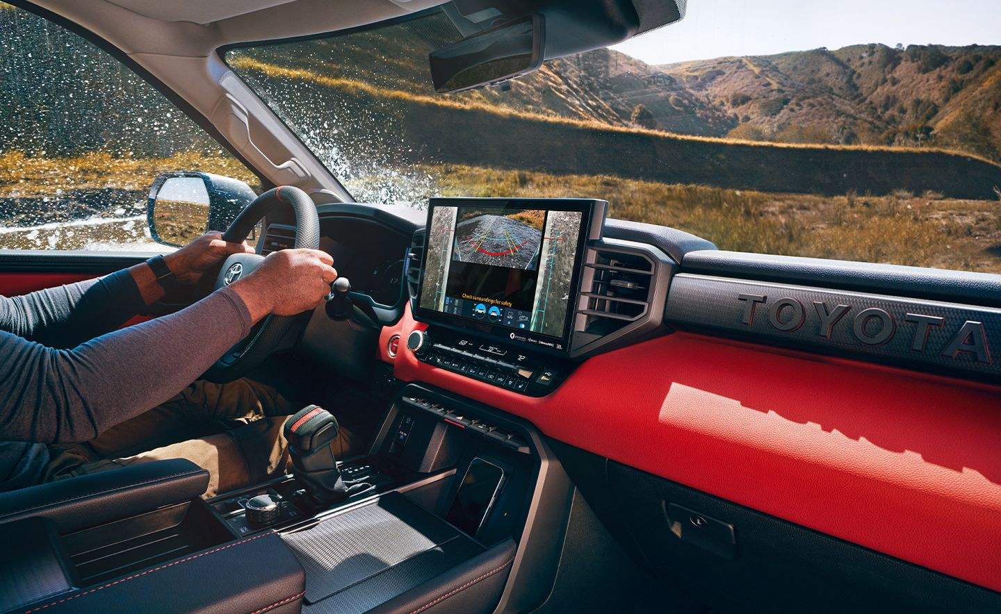 inside a 2024 Toyota Sequoia with premium dash, large multimedia touchscreen