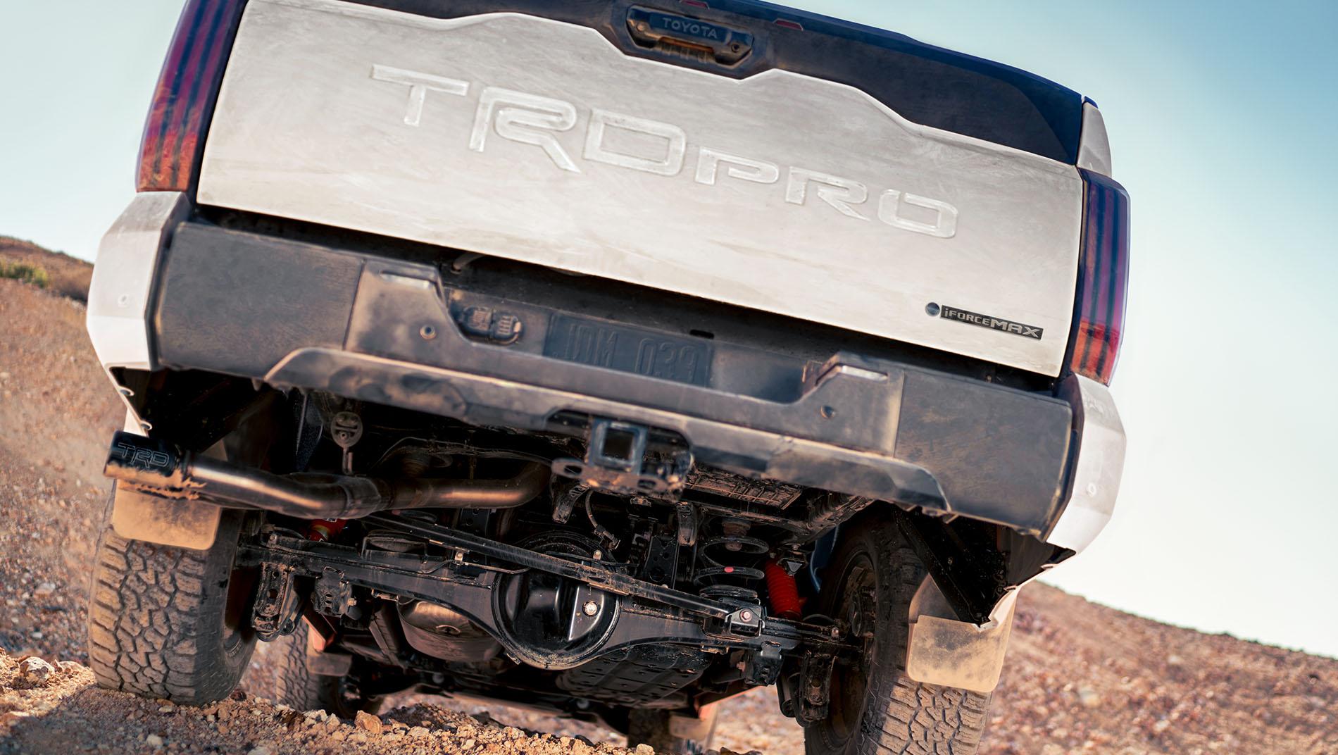 Close-up view of a dirty Toyota TRD Pro truck's rear, showing the raised undercarriage.
