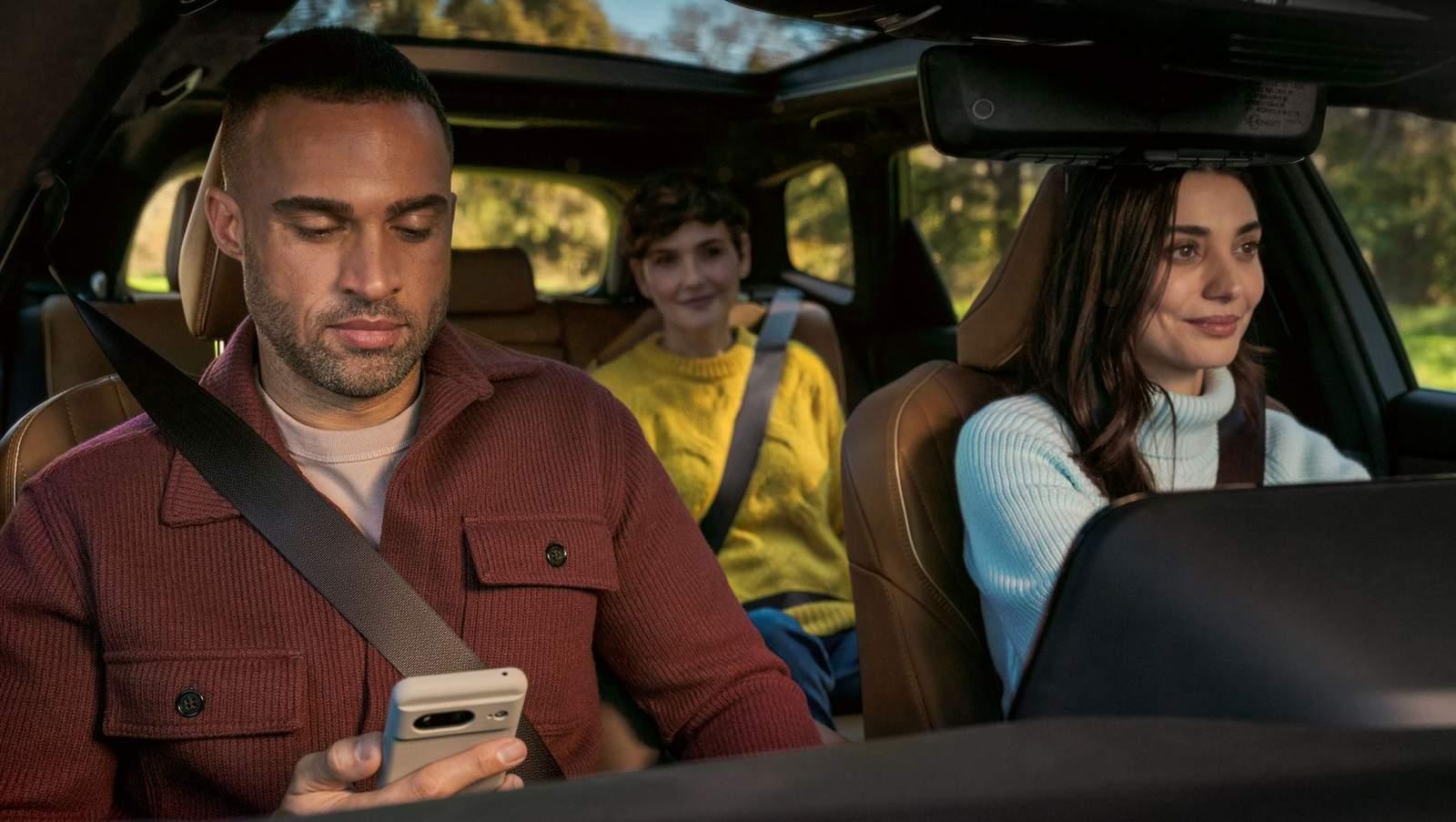 Family riding inside a spacious Toyota Crown Signia Hybrid with panoramic sunroof