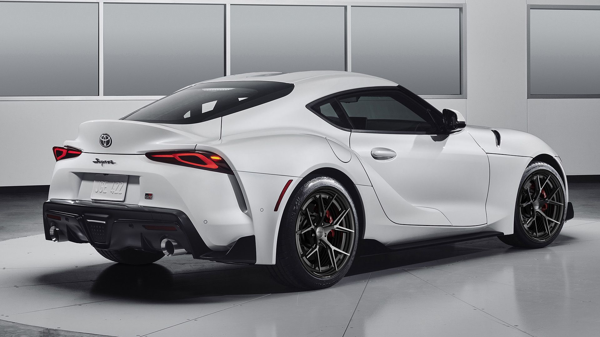 white Toyota Supra in a white studio