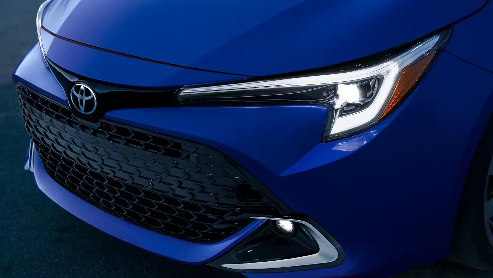 front end of a blue Toyota Corolla Hatchback