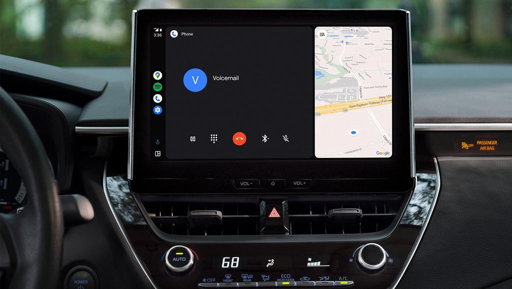 A car’s dashboard screen displays a split view with a voicemail call on the left and a Google Maps navigation route on the right.