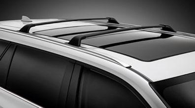 Roof rack Toyota accessories over a panoramic moonroof on a Toyota