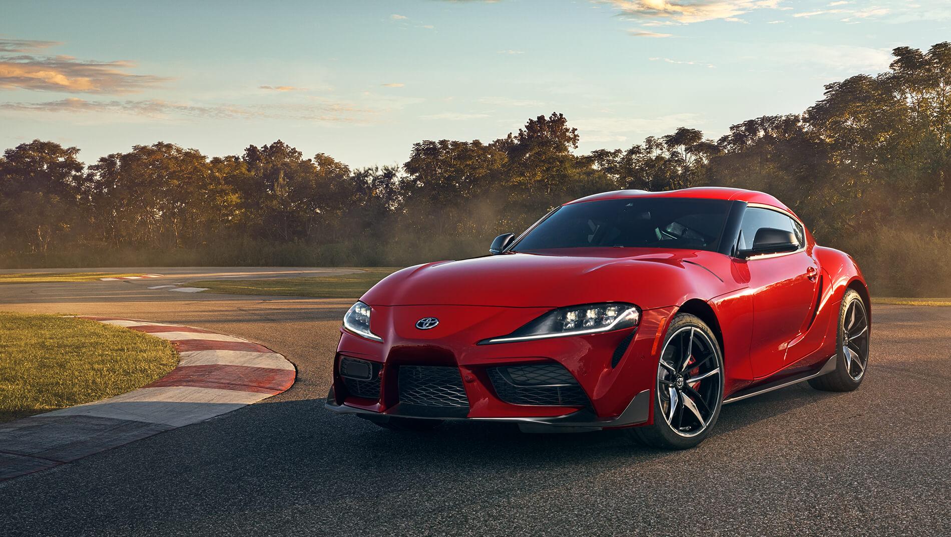 2023 Toyota Supra in red on race course