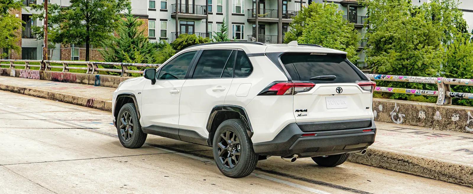 white Toyota RAV4 Xseries parked on the Jackson Bridge