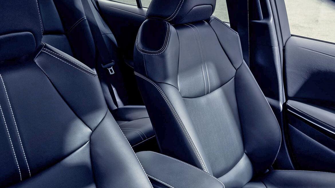 inside Toyota Corolla with black leather seats