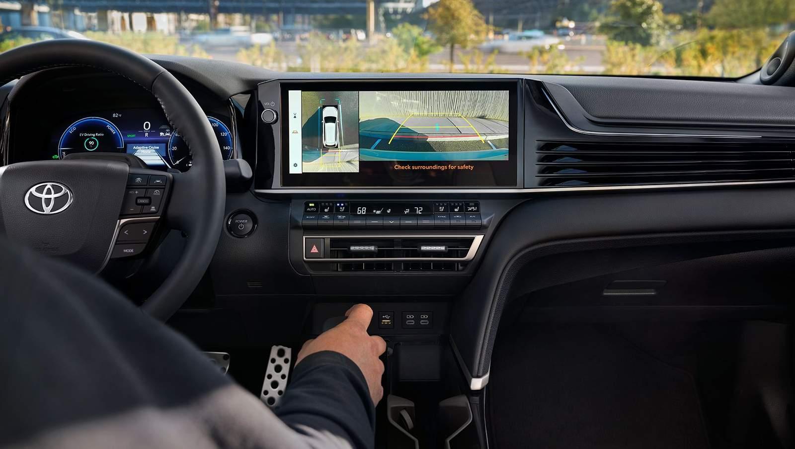 2025 Toyota Camry inside shot showing rearview camera angles and options for safety