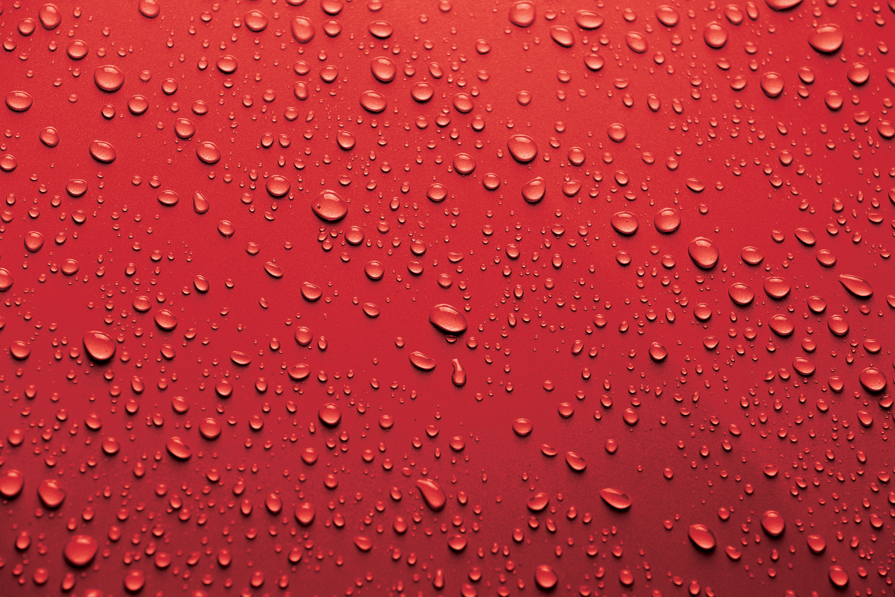 water beading on red paint
