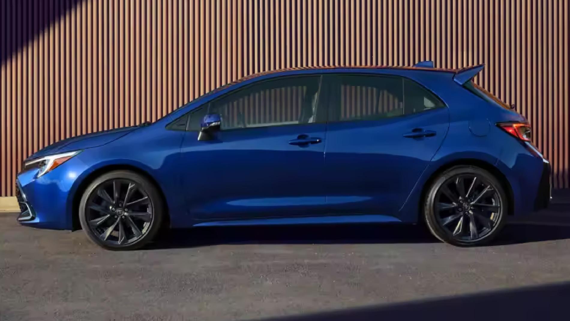 side angle of the outside of a blue Toyota Corolla Hatchback