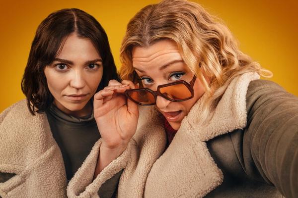 Co-creators and writers Daisy May Cooper and Selin Hizli as Nic and Jen (Credit: BBC/Boffola Pictures/Lookout Point/James Pardon)