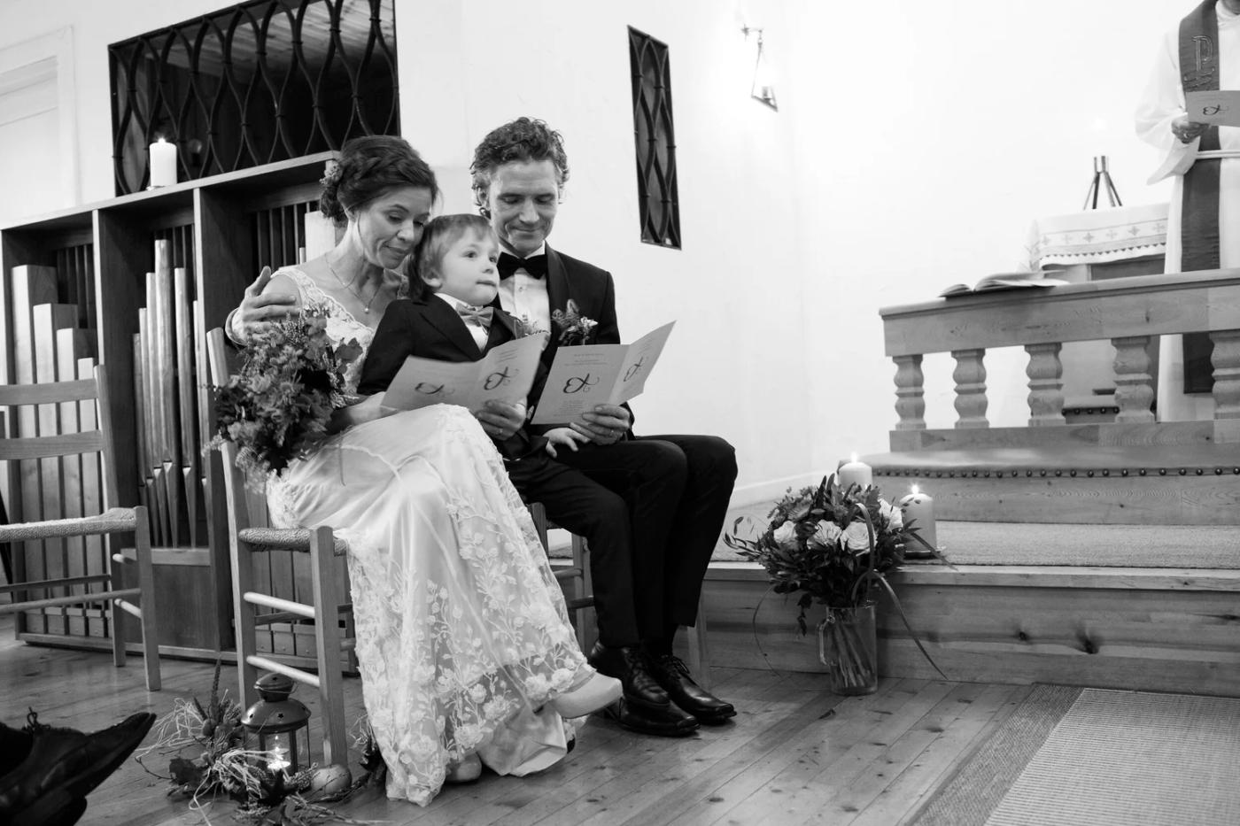 In the church with a child on her lap