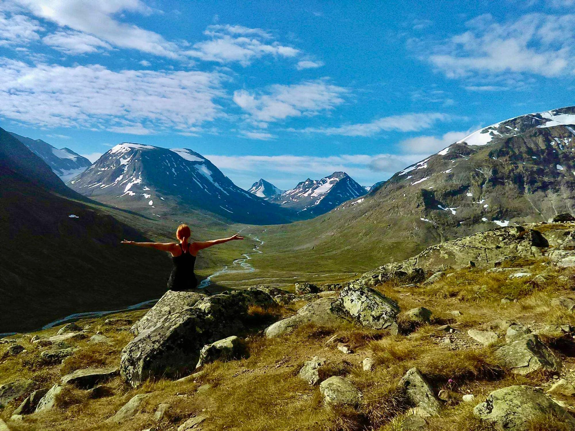 Eva and her dog in the mountains