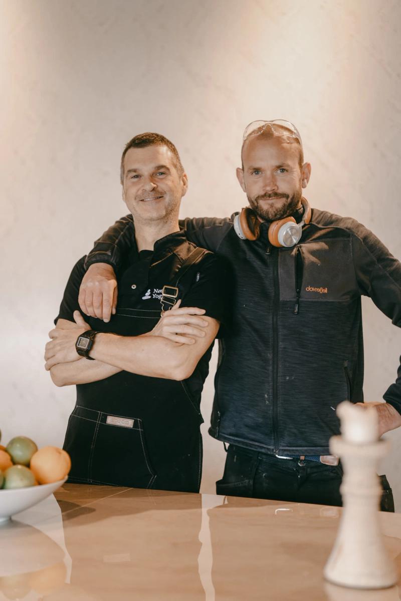 Two of the kitchen team by the reception