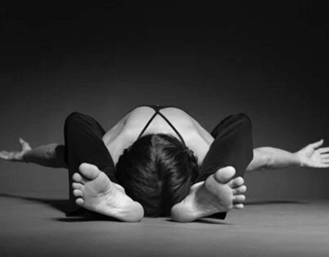 Kurmasana, the tortoise pose
