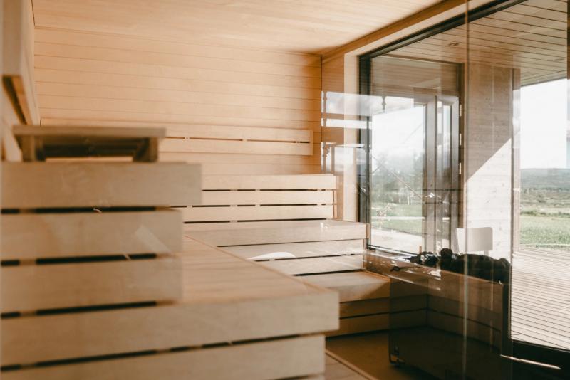 The sauna, with glass doors onto the deck
