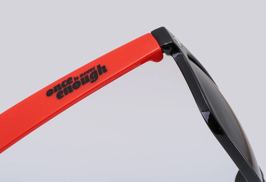 Temple branding area on neon-colored sunglasses DM-579