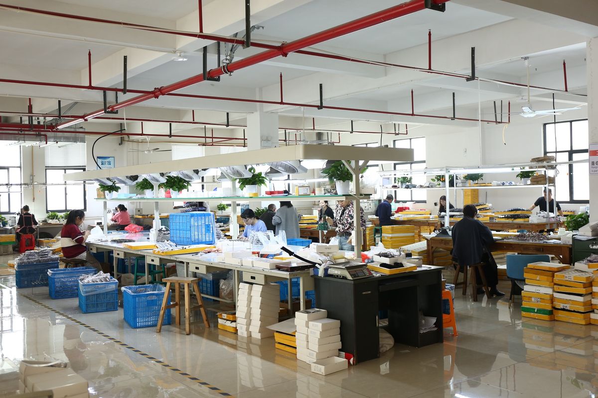 Overview of the DOMI eyewear factory production floor