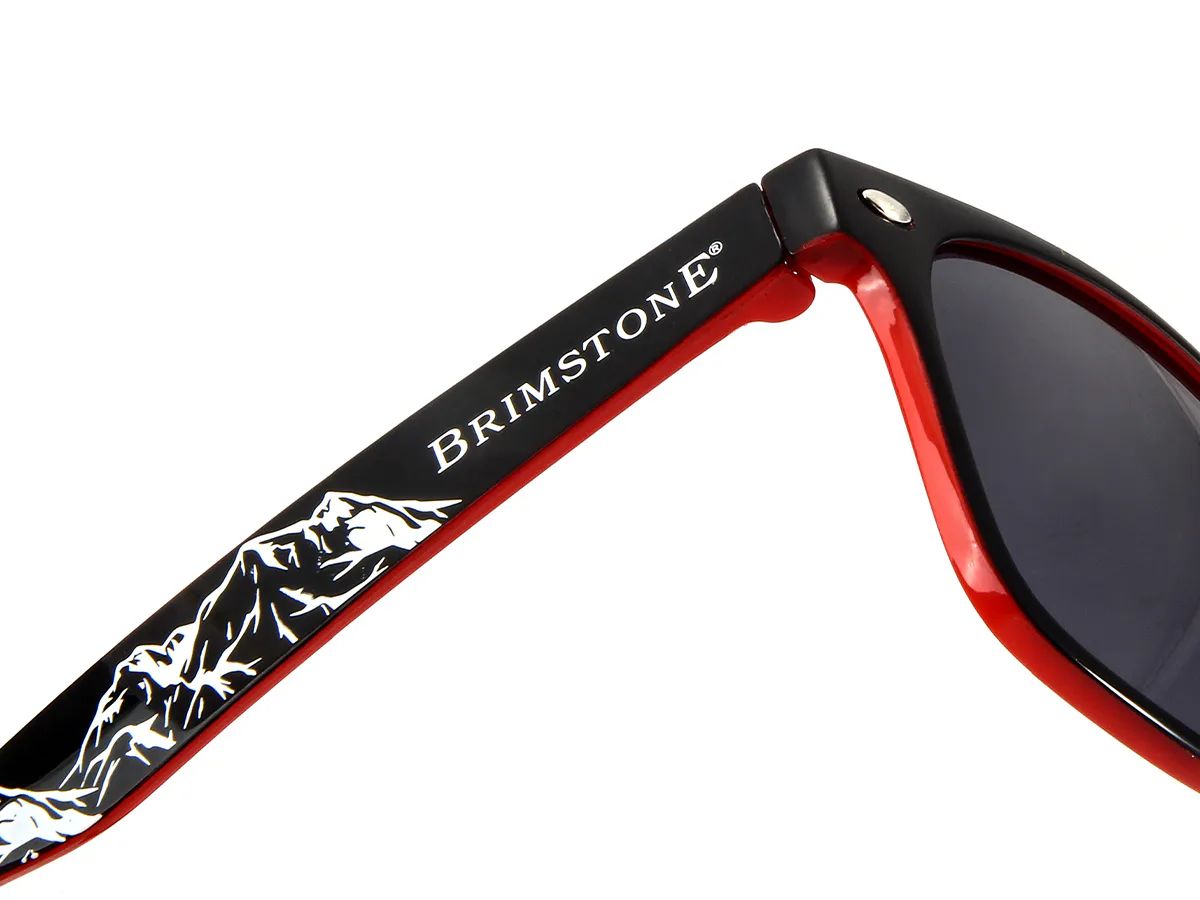 Detailed heat transfer graphic on a black and red sunglasses temple
