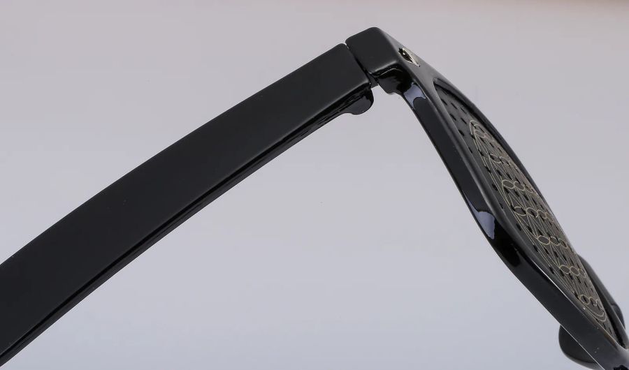 Temple and pinhole panel detail on custom pinhole sunglasses DM-580