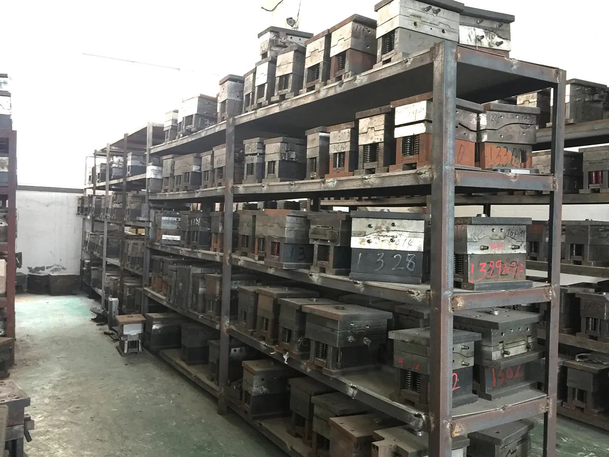DOMI tooling facility with injection molds stored on racks