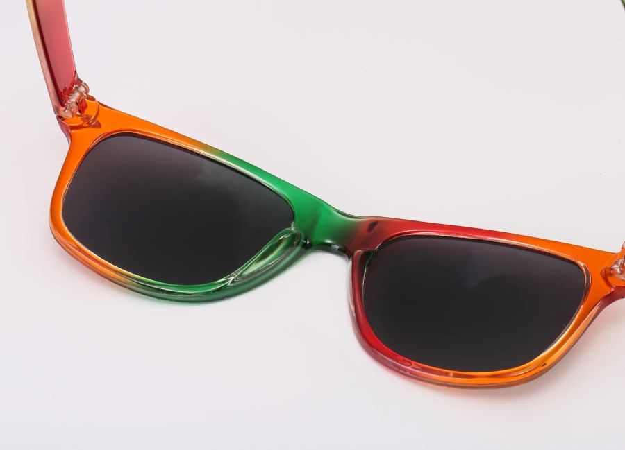 Lens and multicolor frame detail on rainbow sunglasses DM-576