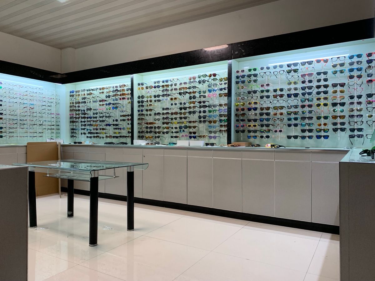 DOMI sample room displaying sunglasses and optical frames
