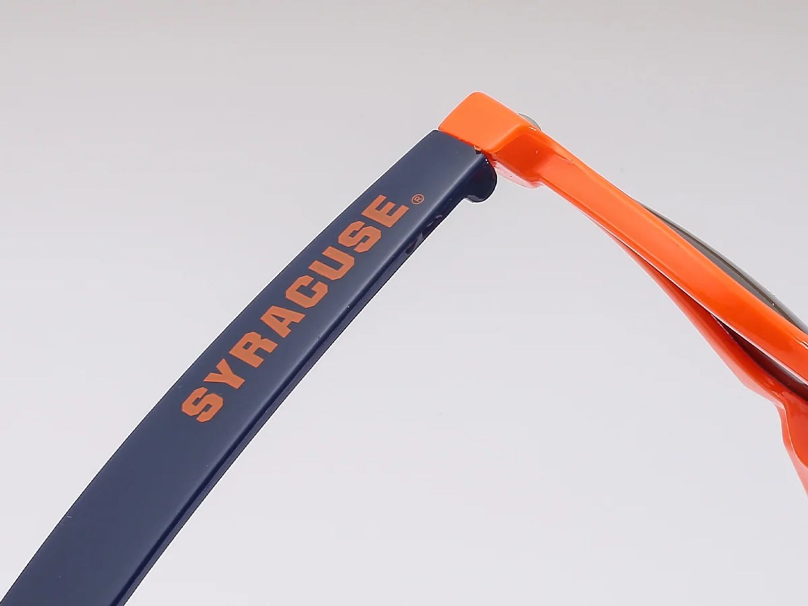 Custom logo positioned on the outer temple of sunglasses