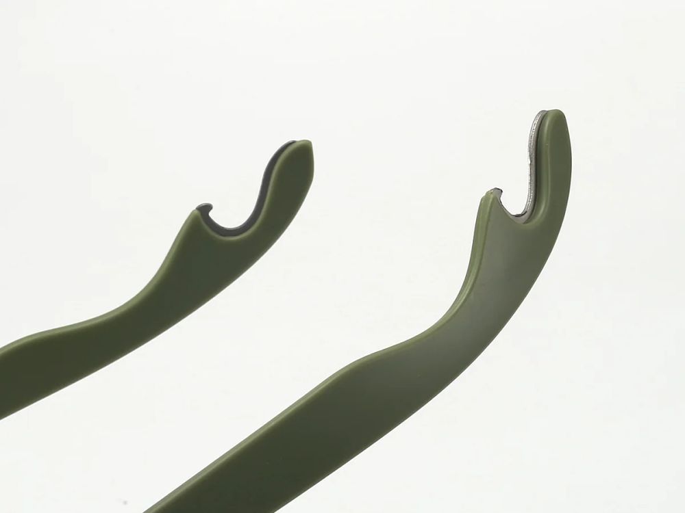 Bottle-opener inserts embedded in sunglasses temples