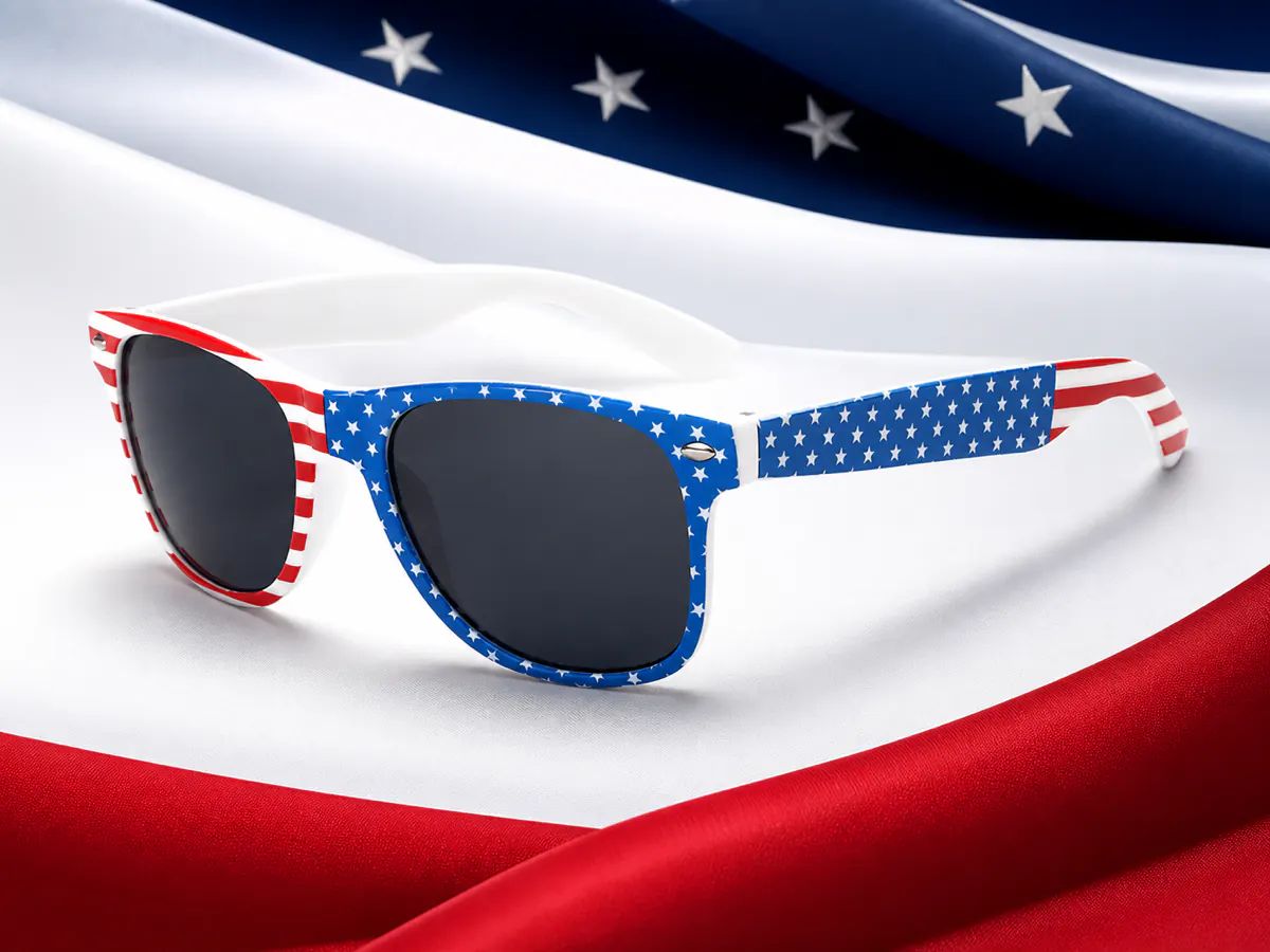 Selection of country-flag sunglasses prepared for a ten-design promotional order